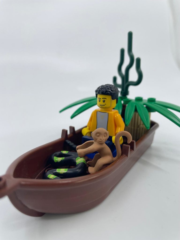 Figurine in boat